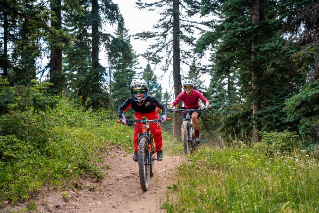 Mom follows her Power Kid down Shangri-la at  the bike park at Purgatory